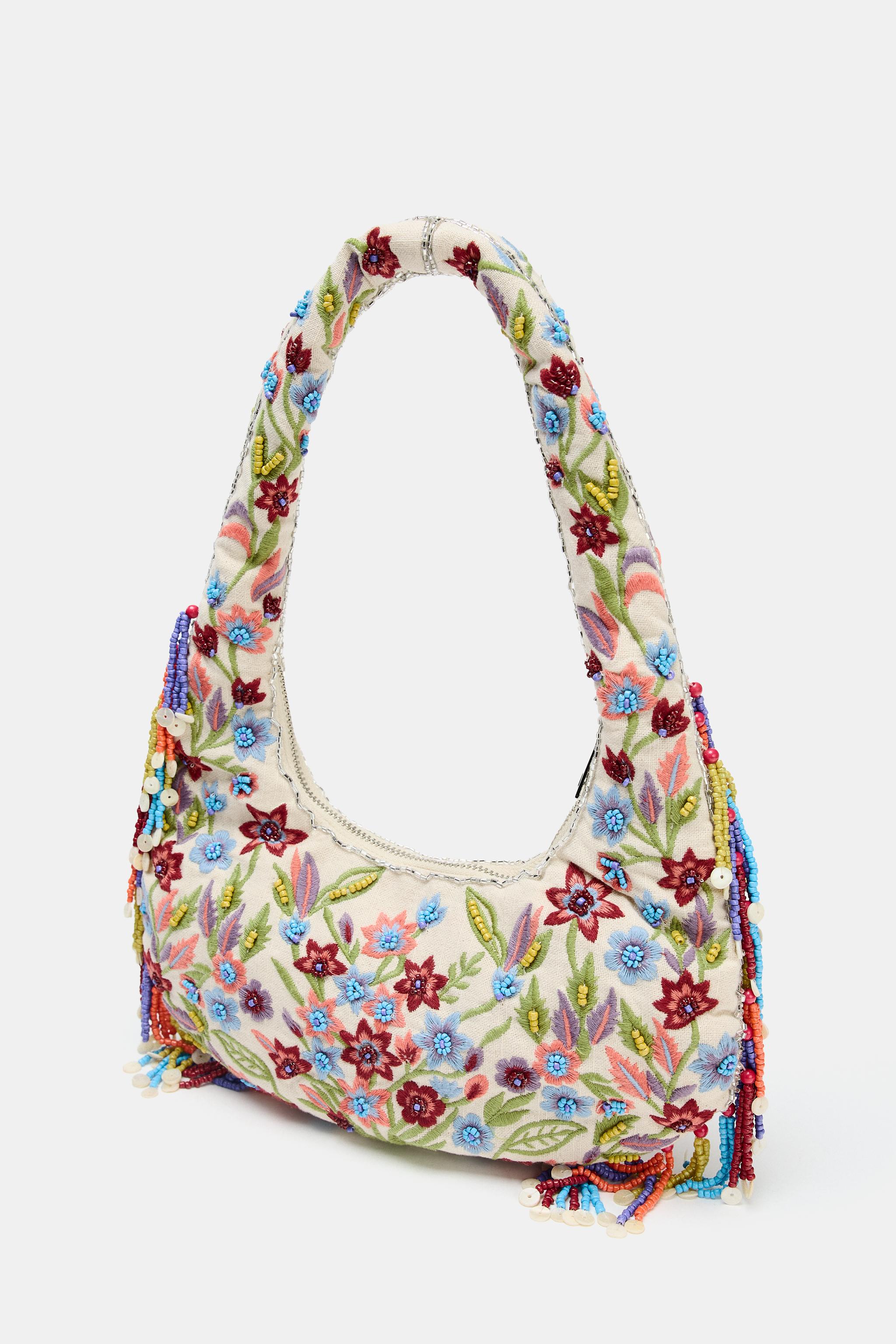 OVAL BAG WITH FLORAL EMBROIDERY